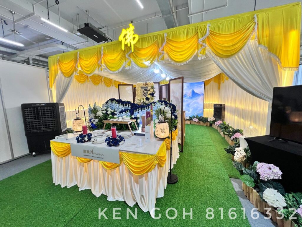 Buddhist funeral altar setup with yellow and white ceremonial decorations
